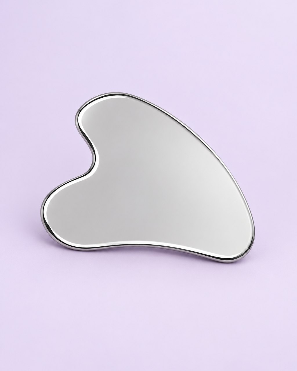 Heart-shaped stainless steel gua sha with a mirror finish