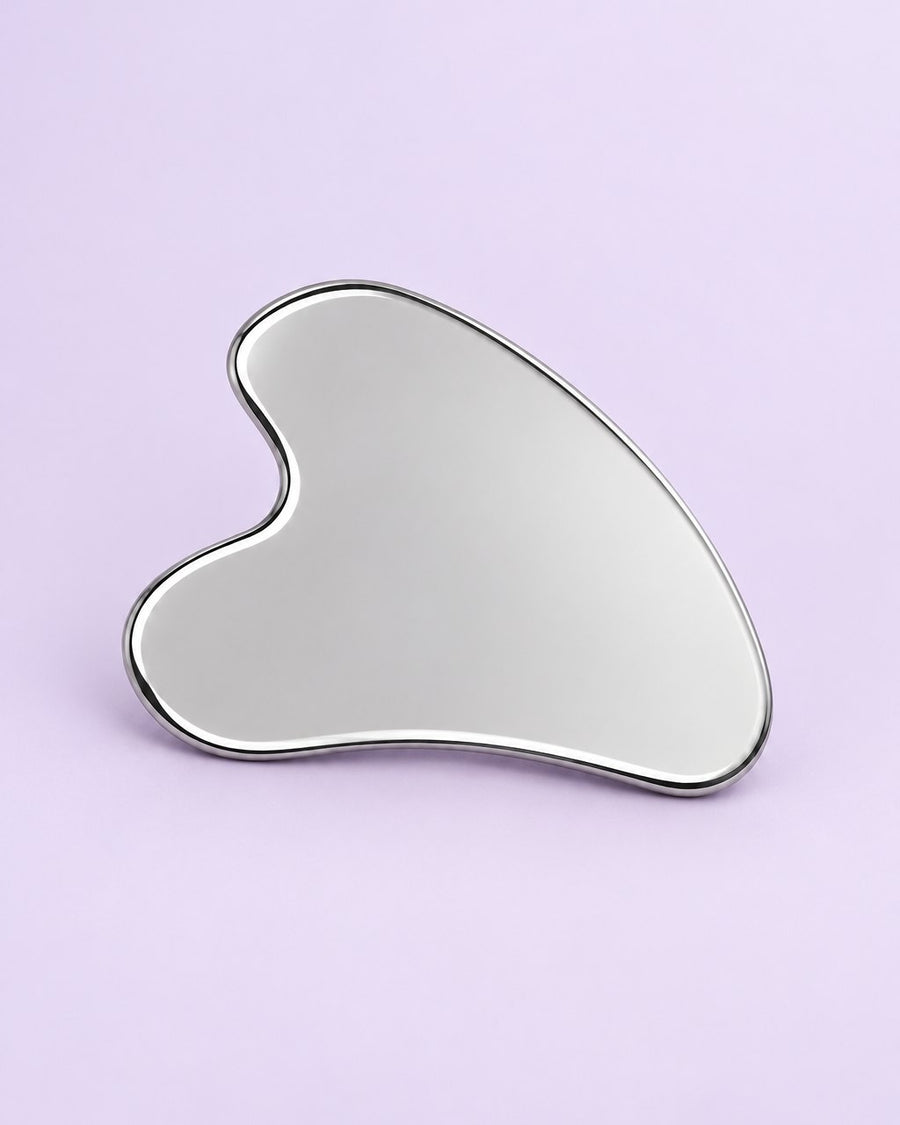 Heart-shaped stainless steel gua sha with a mirror finish
