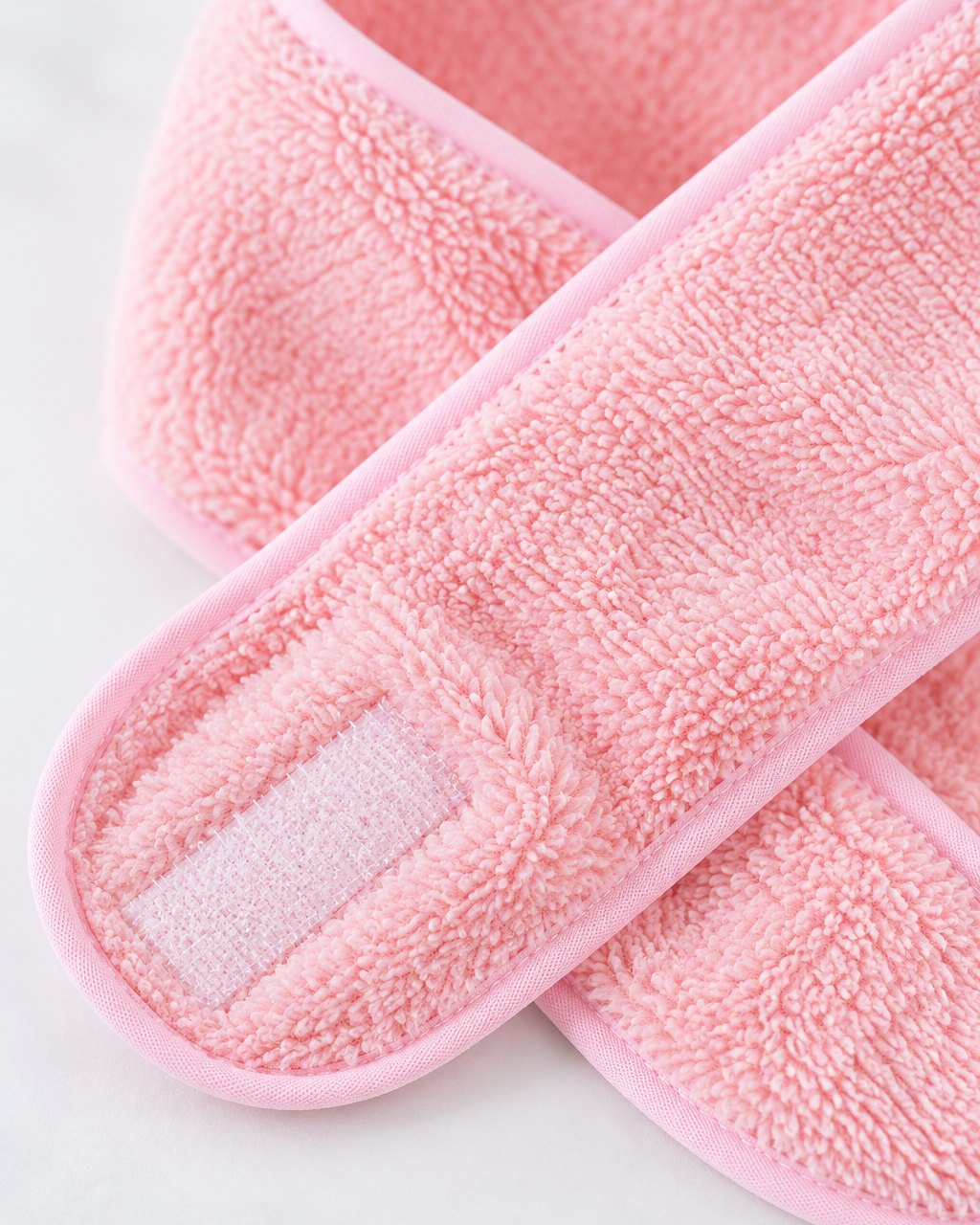 Close-up of the hook-and-loop tab and plush texture