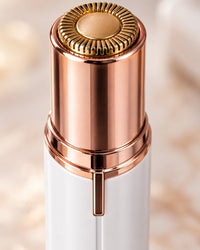 Close-up of the round gold-tone head with its slotted guard