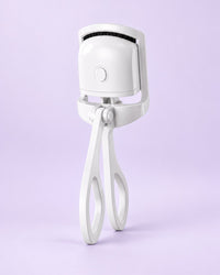 White heated lash curler