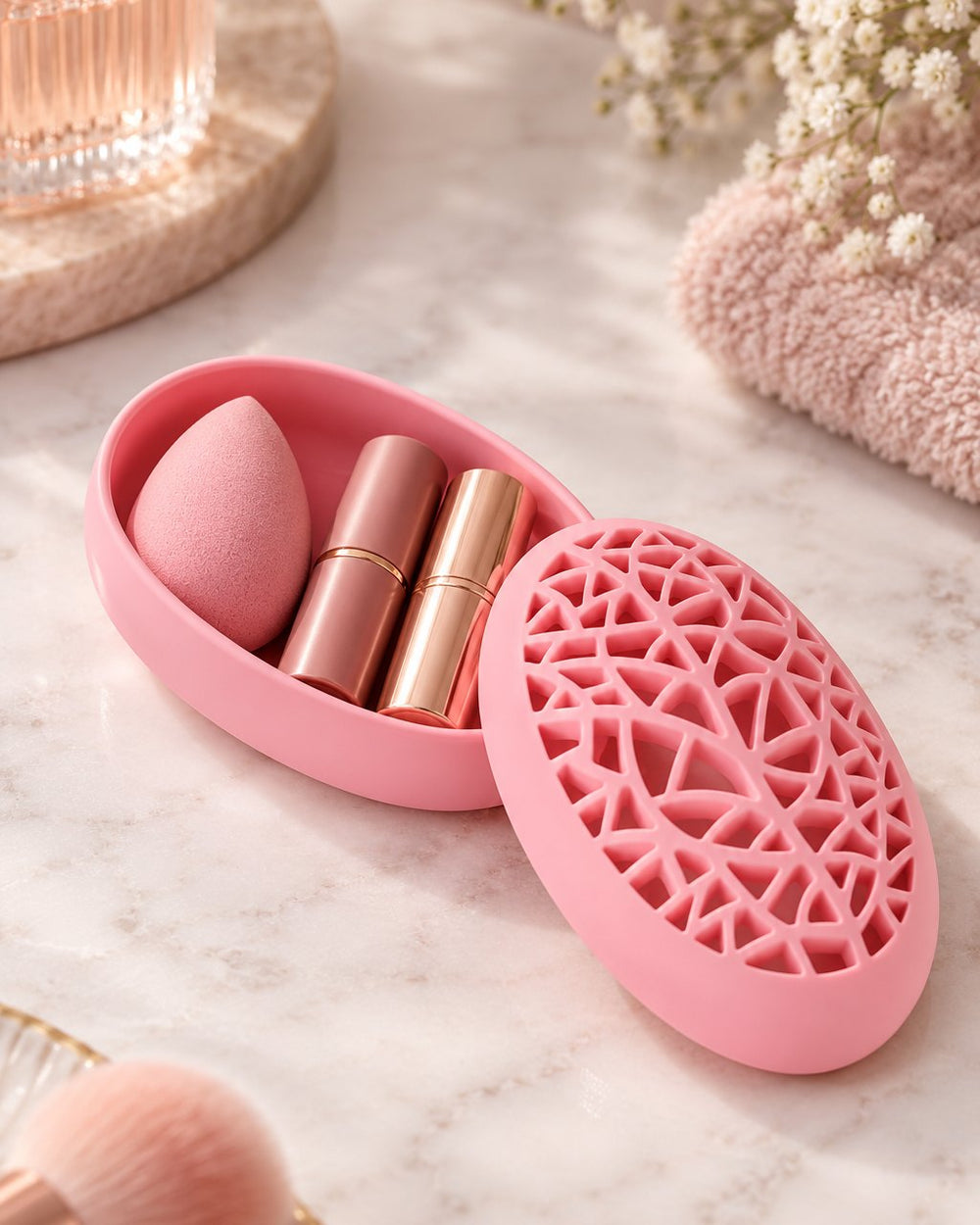 Lid lifted to show a beauty sponge stored inside