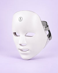White LED face mask with a touch button on the forehead
