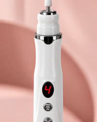 Close-up of the ceramic polishing head and the speed display on the pen