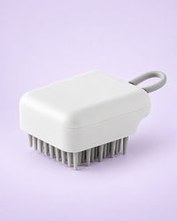 White scalp shampoo brush with grey bristles