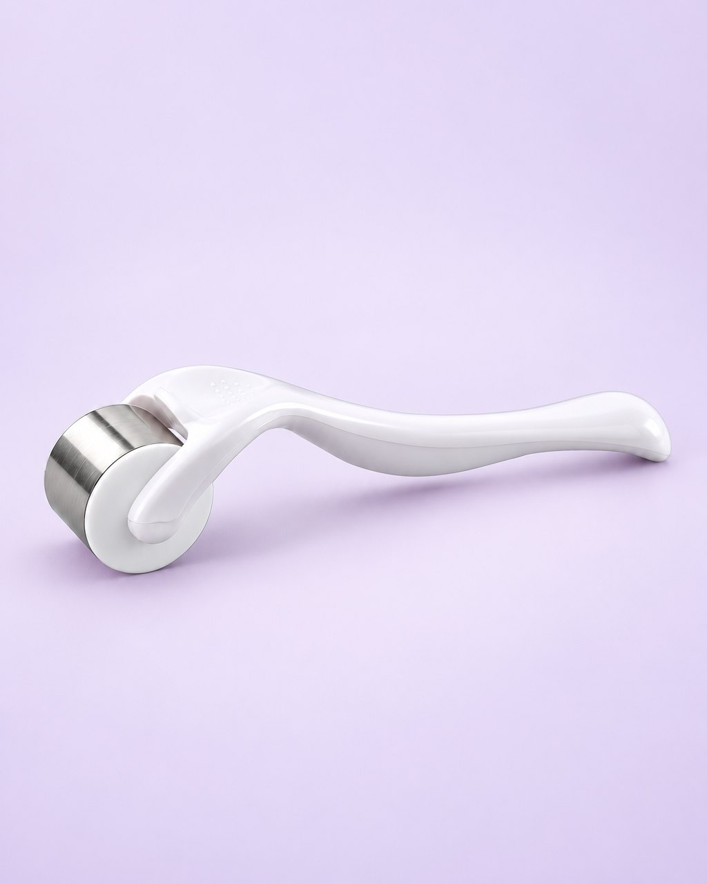 White ice roller with a stainless steel roller head