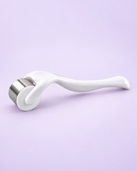 White ice roller with a stainless steel roller head